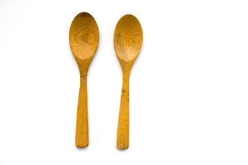 Wood spoons on white background on top view. for food concept.