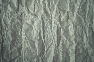 Gray crumpled paper background, texture