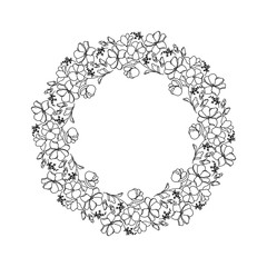 Round black and white frame with flowers.