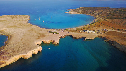 Aerial drone photo of famous caves of Ksylobatis near Pori beach, Koufonissi island. Cyclades, Greece