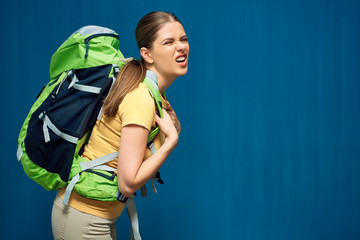 Tired girl with heavy backpack