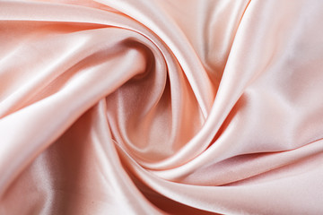 Smooth elegant pink silk or satin texture can use as wedding background