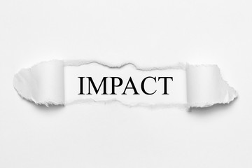 Impact on white torn paper