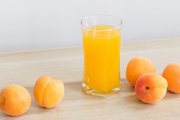 peach juice on wooden table