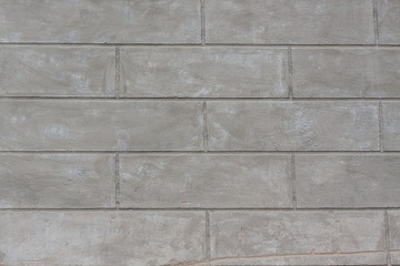 Old concrete block wall background and texture