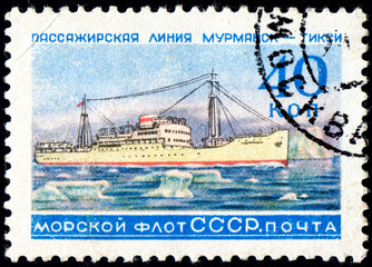 UKRAINE - CIRCA 2017: A postage stamp printed in USSR shows Soviet Liners Ship and Inscription Soviet Navy, Passage line Murmansk - Tiksi, from the series Ships, circa 1959