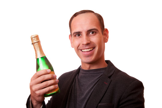 young man with a bottle of champagne on a white background