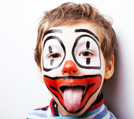 little cute boy with facepaint like clown, pantomimic expression