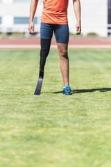 Fototapeta premium Close up disabled man athlete with leg prosthesis.