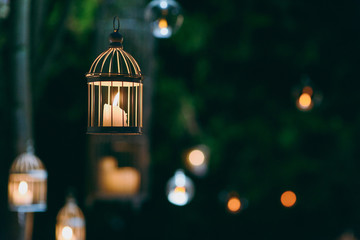 Original wedding floral decoration in the form of mini-vases and bouquets of flowers hanging from the ceiling