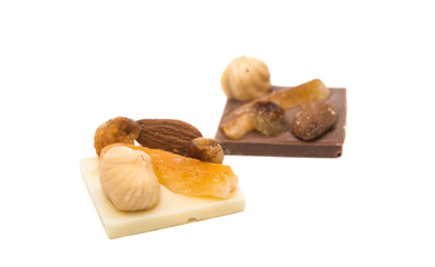 Chocolate with nuts and raisins isolated