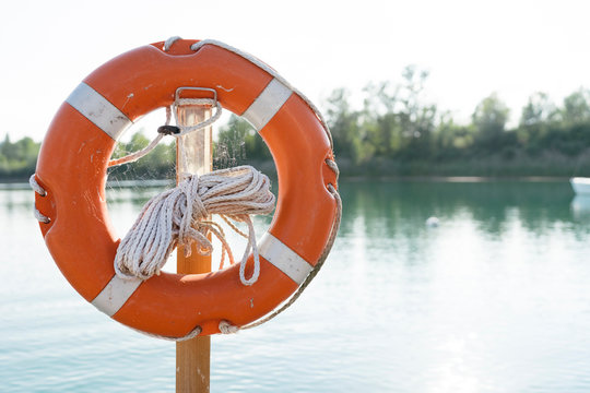 Lifesaver ring, beside lake, close-up