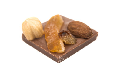Chocolate with nuts and raisins isolated