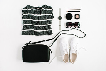 Trendy fashion black styled woman clothes and accessories collection on white background. Flat lay,...