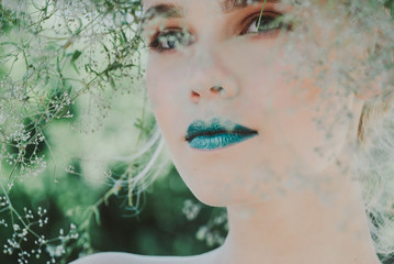 Fashion portrait of Young blond woman.Beautiful Girl with green lips