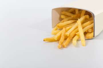 French fries on a white background. fast food