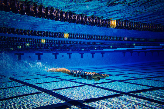 Swimmer underwater in pool