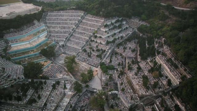 Hong Kong Aerial v102 Birdseye view flying low over St Raphael Cemetery panning