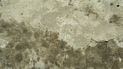 Aged shabby wall. Old faded concrete surface. Brown sepia stone texture