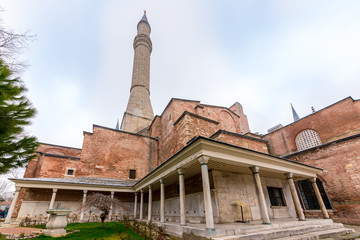 Fototapeta na wymiar Exterior view of Hagia Sophia,a Greek Orthodox Christian patriarchal basilica (church),built in 537 AD, later an imperial mosque, and now a museum in Istanbul, Turkey