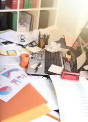 Messy and cluttered desk, light effect