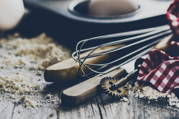 Baking concept kitchen cooking cutlery accessories for baking on wooden background with flour....