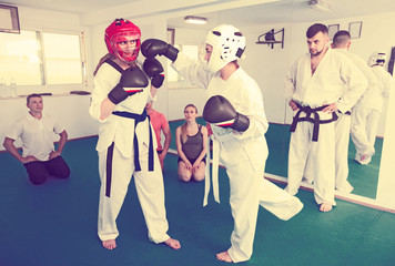 Women practicing at taekwondo class