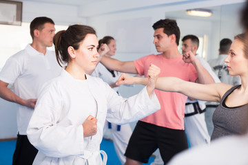 Men and women learn karate © JackF