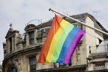Gay rainbow flag at an LGBT gay pride march in London