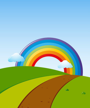 Scene with rainbow at the end of road