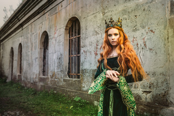 Woman in green medieval dress © grape_vein