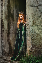 Woman in green medieval dress