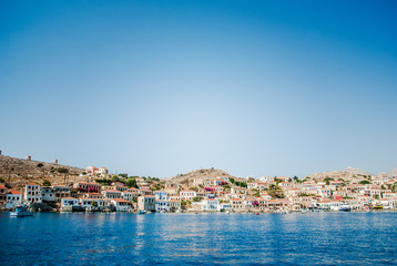 Naklejka na ściany i meble Chalki Island, one of the Dodecanese islands of Greece, close to Rhodes.