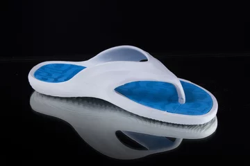 Foto op Plexiglas Male White and Blue Slipper on Black Background, Isolated Product, Top View, Studio. © GeorgeVieiraSilva