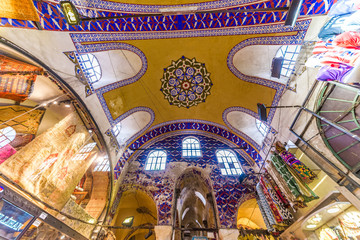 Unidentified Tourists visiting and shopping in the Grand Bazaar in Istanbul. Interior of the Grand...