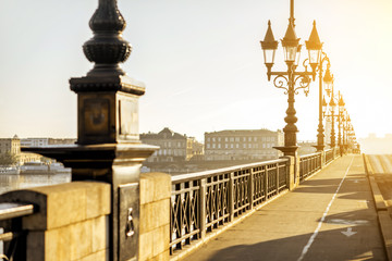 Fototapeta na wymiar Beautiful view on the famous saint Pierre bridge during the morning light in Bordeaux city, France