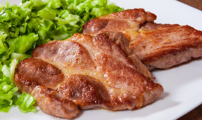 meat fillet steak with vegetables salad in a plate