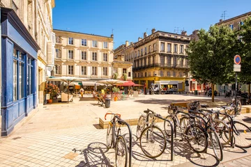 Foto op Plexiglas View on the small square with bicycles in Bordeaux city in France © rh2010