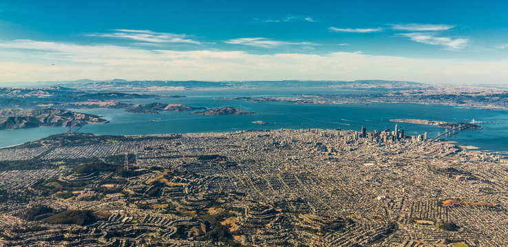 Aerial view of San Francisco wide area with bay and bridges