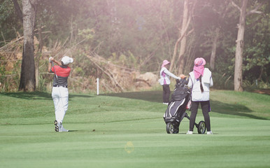 Women play golf as a profession that requires patience with the sun, the pressure of competitors.