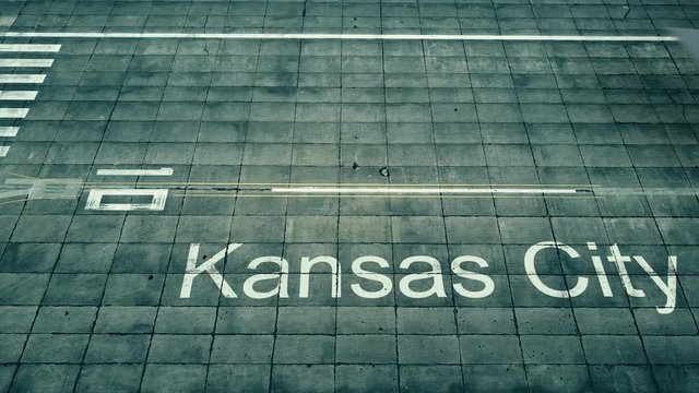 Aerial view of big airplane arriving to Kansas City airport. Travel to the United States conceptual intro animation