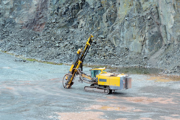 Driller in a quarry mine. mining industry.