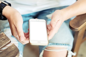 Mobile phone in man hands with isolated blank screen.