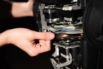 The equipment repair engineer diagnoses the breakdown of light equipment