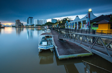 the kuching waterfornt,kuching sarawak with boats and jetty on 8 july 2017