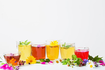 herbal tea in cups on a white background