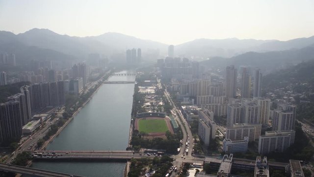 Hong Kong Aerial v116 Flying over along Shing Mum River in Sha Tin area with cityscape views