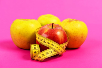 Composition of ripe apples and tape for measuring