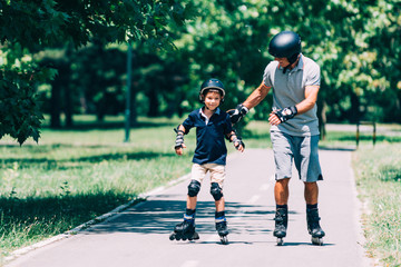 Roller skating summer fun with grandpa