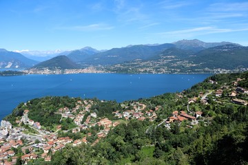 Fototapeta na wymiar Lake Maggiore in summer, view to Laveno Mombello, Italy 